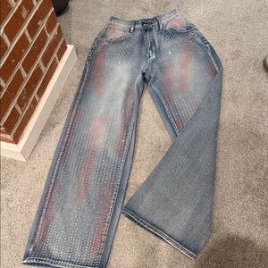 Studded Blue Jeans with Red Accents